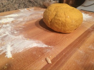 Pumpkin Sacchetti Pasta with crumbled sausage and a bechamel sauce with crumbled amaretti