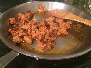 Pumpkin Sacchetti Pasta with crumbled sausage and a bechamel sauce with crumbled amaretti